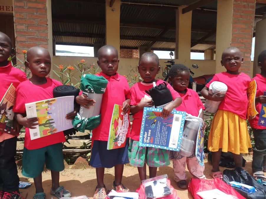 children sponsored with food, clothes and blanket picture