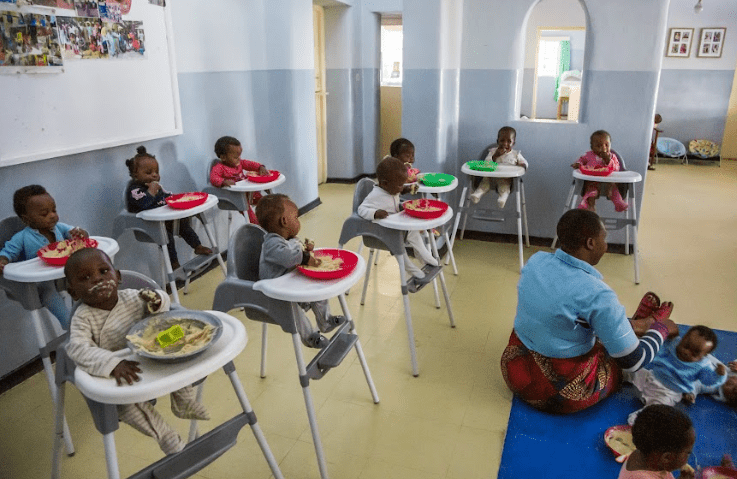 babies being fed at Open Arms Malawi