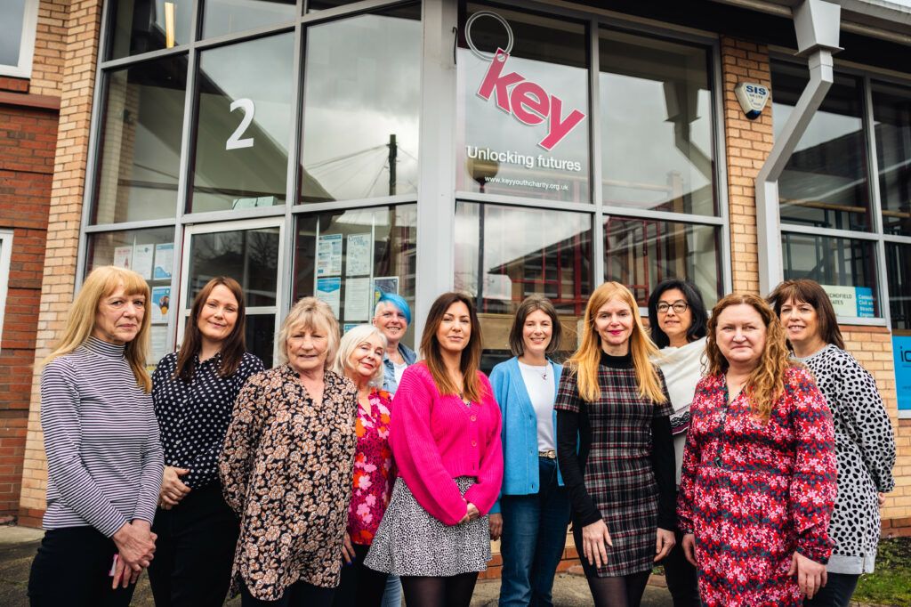 Volunteers outside the building for Key Unlocking Futures charity