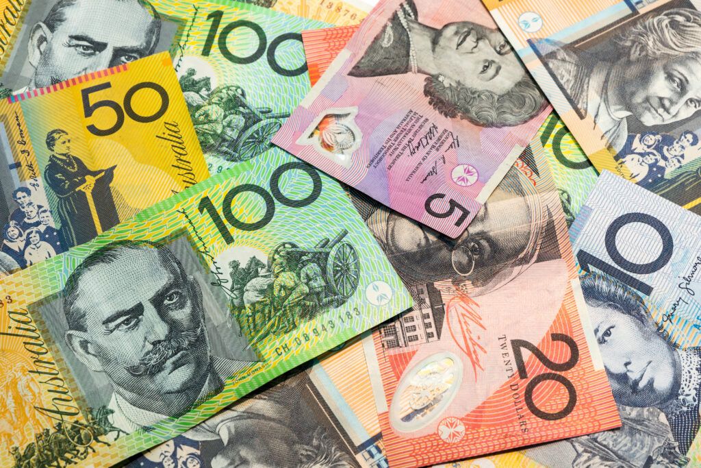 Pre euro currency and euro banknotes scattered